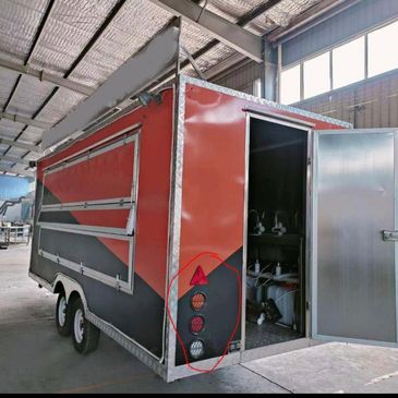 Full-Sized Food Trailer with Mounted Sign